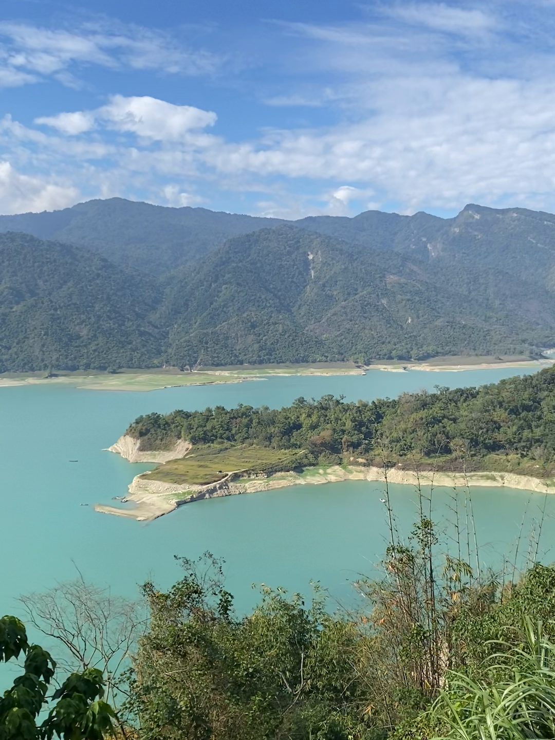 Remote but perfectly maintained paved mountain roads south of Chiayi (left), and celeste water at the Zengwen Reservoir (right)